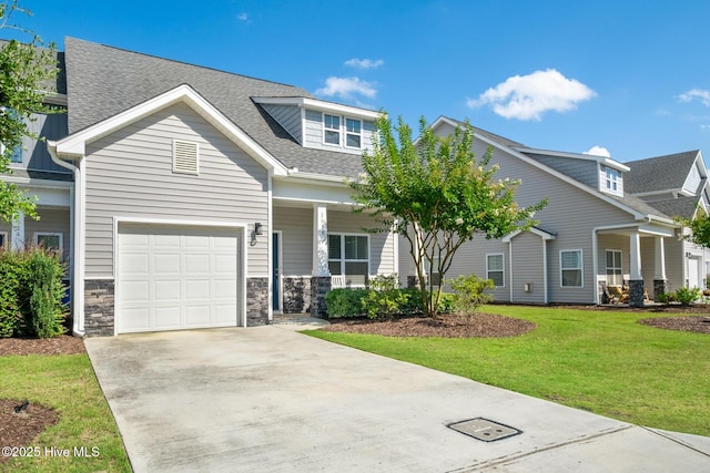 1620 Bratton Ct, Wilmington, NC 28405 - craftsman inspired home with covered porch, a front lawn, concrete driveway, a shingled roof, and an attached garage