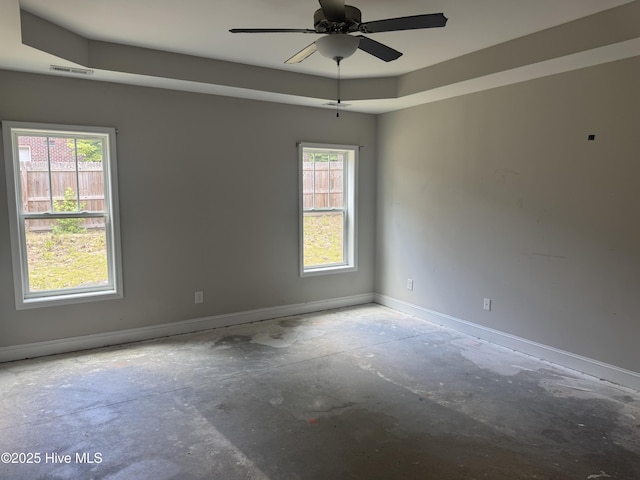 600 Burning Tree Rd, Pinehurst, NC 28374 - empty room with unfinished concrete flooring and a ceiling fan