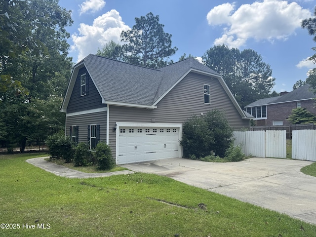 600 Burning Tree Rd, Pinehurst, NC 28374 - view of property exterior featuring concrete driveway and roof with shingles