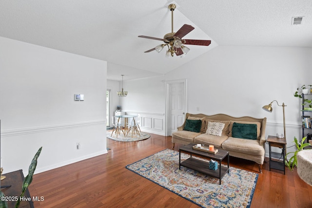 2827 Sapling Cir, Wilmington, NC 28411 - living area with a ceiling fan, vaulted ceiling, wood finished floors, and wainscoting