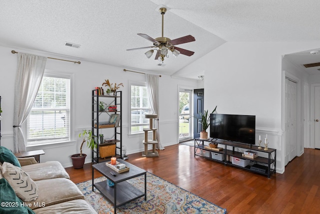 2827 Sapling Cir, Wilmington, NC 28411 - living area featuring ceiling fan, wood finished floors, a wainscoted wall, lofted ceiling, and a textured ceiling