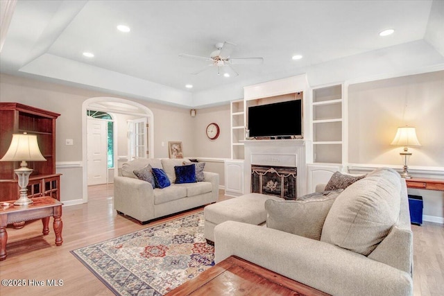 104 Tall Pines Pl, Goldsboro, NC 27534 - living area with ceiling fan, arched walkways, wood finished floors, recessed lighting, and a raised ceiling