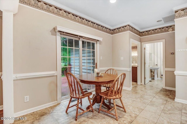 104 Tall Pines Pl, Goldsboro, NC 27534 - dining space with crown molding and baseboards