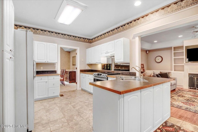104 Tall Pines Pl, Goldsboro, NC 27534 - kitchen featuring freestanding refrigerator, under cabinet range hood, open floor plan, electric stove, and white cabinets