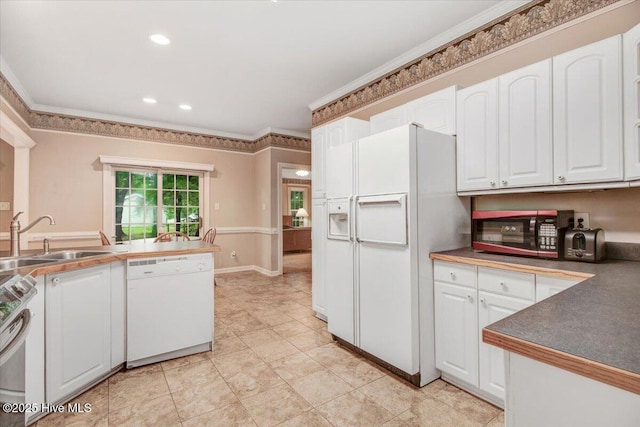 104 Tall Pines Pl, Goldsboro, NC 27534 - kitchen with white appliances, white cabinetry, ornamental molding, recessed lighting, and light tile patterned floors