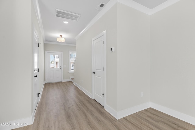 208 Triton Ln, Surf City, NC 28445 - foyer with crown molding and light wood-type flooring