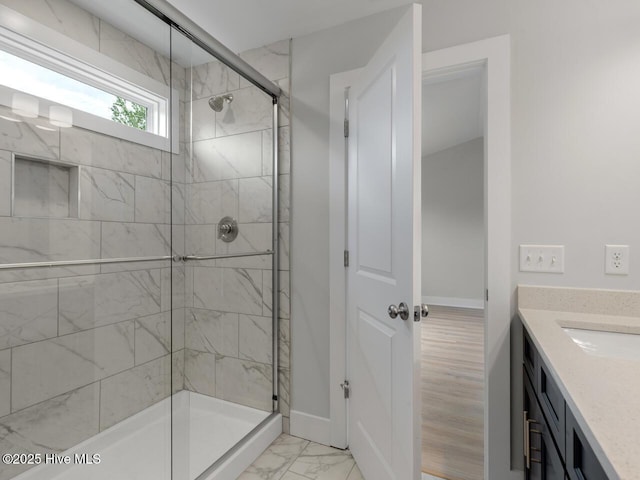 208 Triton Ln, Surf City, NC 28445 - full bath featuring a shower stall, vanity, and marble finish floors