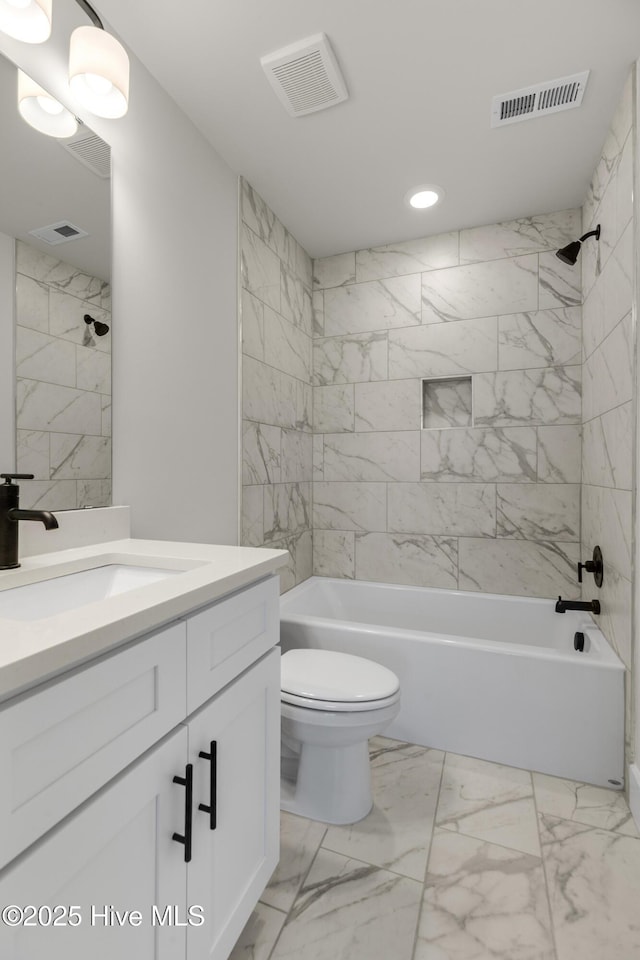 208 Triton Ln, Surf City, NC 28445 - bathroom featuring vanity, marble finish flooring,  shower combination, and recessed lighting