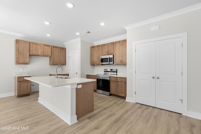 208 Triton Ln, Surf City, NC 28445 - kitchen featuring stainless steel appliances, ornamental molding, brown cabinetry, light wood finished floors, and recessed lighting