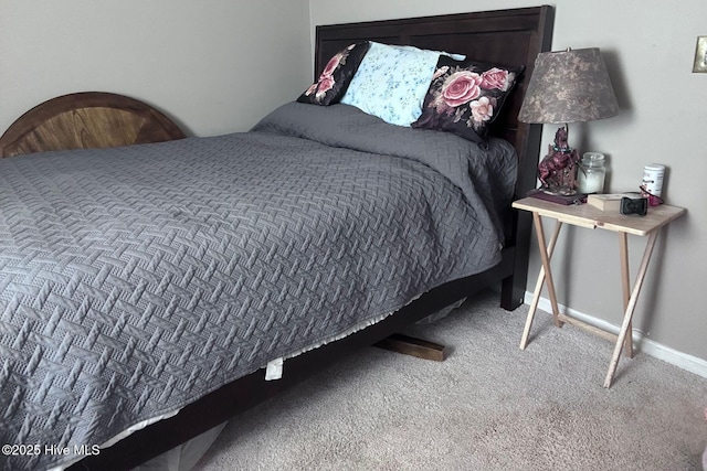 2903 Cedar Creek Rd Apt B, Greenville, NC 27834 - carpeted bedroom featuring baseboards