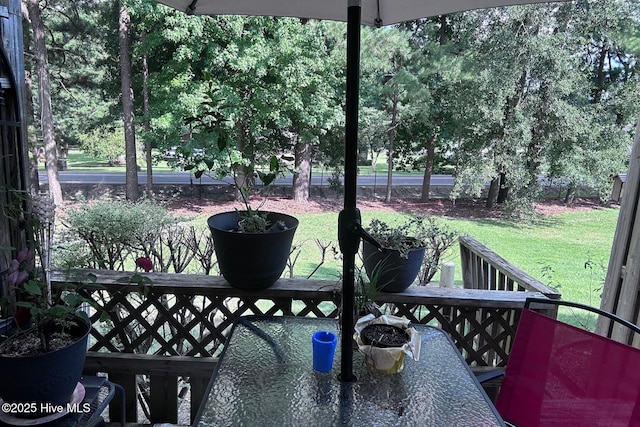 2903 Cedar Creek Rd Apt B, Greenville, NC 27834 - deck featuring a lawn and outdoor dining space