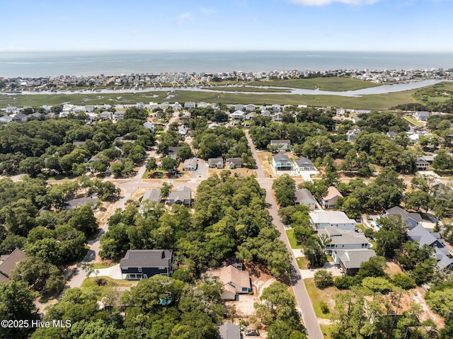 108 NW 29th St, Oak Island, NC 28465 - aerial view of residential area with a large body of water