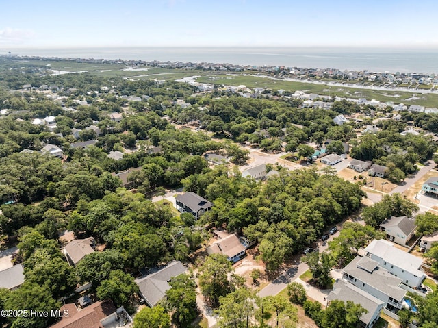 108 NW 29th St, Oak Island, NC 28465 - aerial perspective of suburban area with a nearby body of water