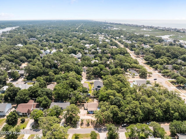 108 NW 29th St, Oak Island, NC 28465 - aerial view of residential area with a large body of water