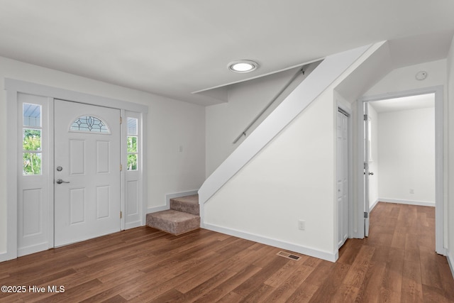 108 NW 29th St, Oak Island, NC 28465 - entryway featuring stairway and wood finished floors