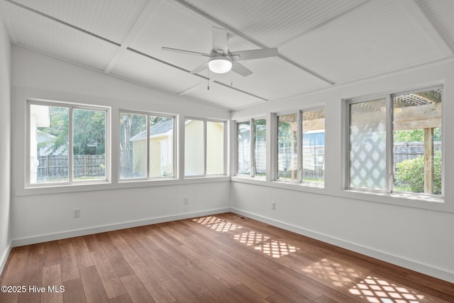 108 NW 29th St, Oak Island, NC 28465 - unfurnished sunroom featuring plenty of natural light, lofted ceiling, and hardwood / wood-style flooring