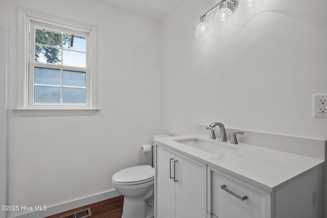 108 NW 29th St, Oak Island, NC 28465 - half bath with vanity and wood finished floors