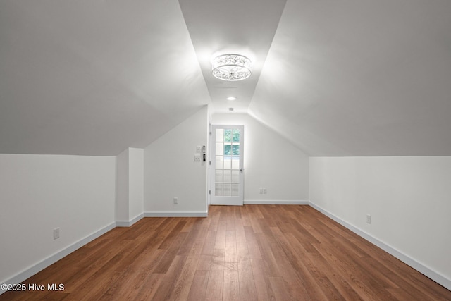 108 NW 29th St, Oak Island, NC 28465 - bonus room featuring lofted ceiling and wood finished floors