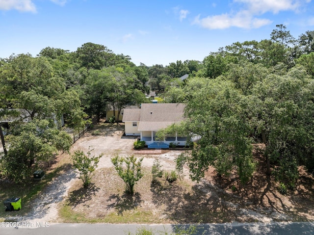 108 NW 29th St, Oak Island, NC 28465 - aerial view of property and surrounding area featuring a forest