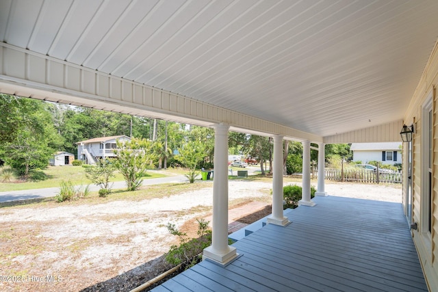 108 NW 29th St, Oak Island, NC 28465 - view of wooden porch