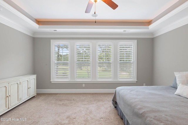 9385 Fallen Pear Ln NE, Leland, NC 28451 - bedroom featuring a raised ceiling, light colored carpet, crown molding, and ceiling fan