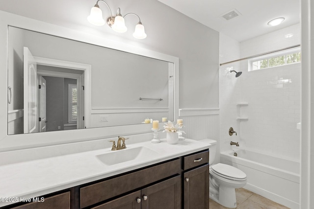 9385 Fallen Pear Ln NE, Leland, NC 28451 - full bath with vanity, bathing tub / shower combination, tile patterned flooring, and a decorative wall