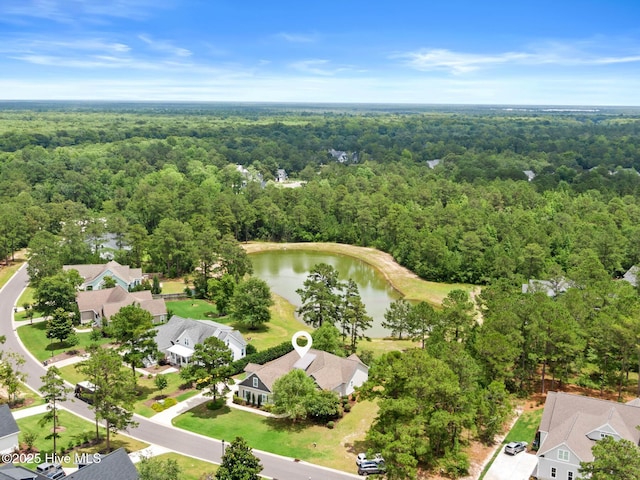 9385 Fallen Pear Ln NE, Leland, NC 28451 - aerial view of residential area featuring a heavily wooded area and a large body of water