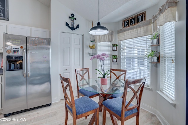 660 Pine Branches Cir SE, Leland, NC 28451 - dining space featuring light wood-style flooring and lofted ceiling