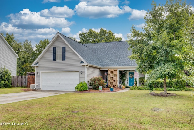 660 Pine Branches Cir SE, Leland, NC 28451 - traditional-style house with an attached garage, driveway, and a shingled roof