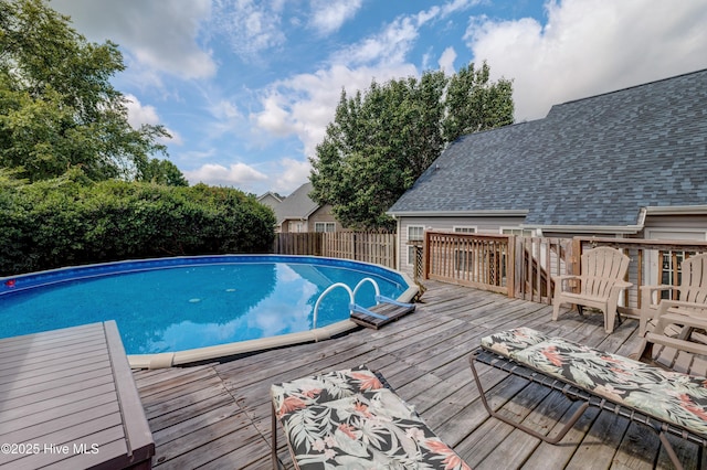 660 Pine Branches Cir SE, Leland, NC 28451 - view of swimming pool featuring a wooden deck