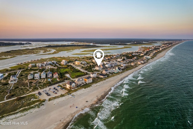 6626 W Beach Dr, Oak Island, NC 28465 - aerial view at dusk of view of water and beach