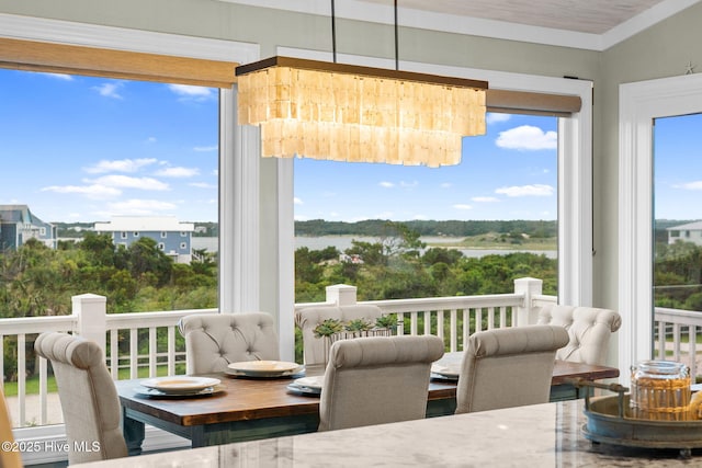 6626 W Beach Dr, Oak Island, NC 28465 - sunroom with a water view