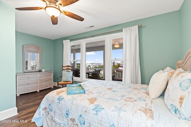 6626 W Beach Dr, Oak Island, NC 28465 - bedroom with access to outside, wood finished floors, and ceiling fan