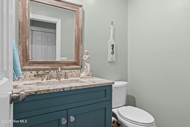 6626 W Beach Dr, Oak Island, NC 28465 - bathroom with vanity and toilet