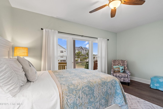 6626 W Beach Dr, Oak Island, NC 28465 - bedroom featuring access to outside, wood finished floors, and ceiling fan