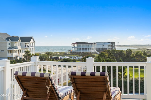 6626 W Beach Dr, Oak Island, NC 28465 - balcony featuring a water view