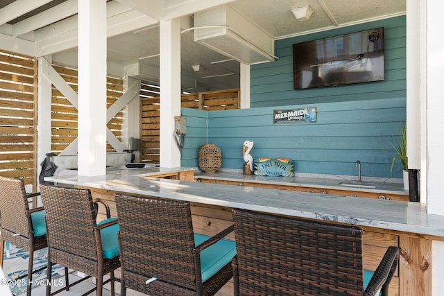 6626 W Beach Dr, Oak Island, NC 28465 - view of patio / terrace featuring an outdoor bar