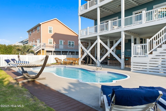 6626 W Beach Dr, Oak Island, NC 28465 - view of swimming pool with stairs and a patio area