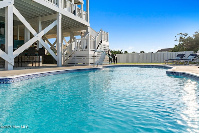 6626 W Beach Dr, Oak Island, NC 28465 - view of pool with stairway and a patio