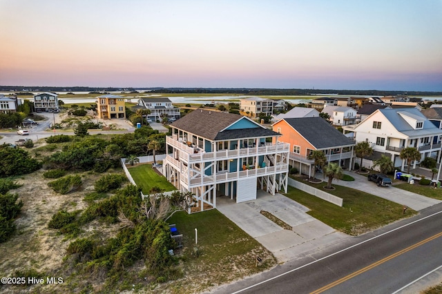 6626 W Beach Dr, Oak Island, NC 28465 - aerial perspective of suburban area