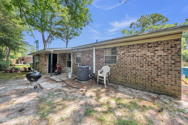 back of property with brick siding