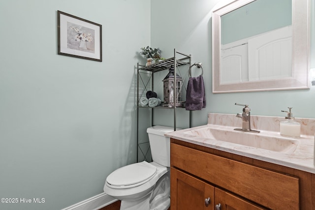 3710 Calla Lilly Ct, Southport, NC 28461 - half bathroom with vanity and toilet
