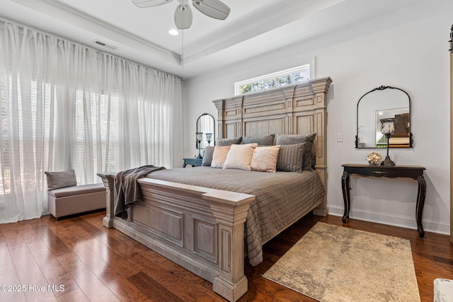 3710 Calla Lilly Ct, Southport, NC 28461 - bedroom featuring a tray ceiling, wood finished floors, a ceiling fan, and recessed lighting