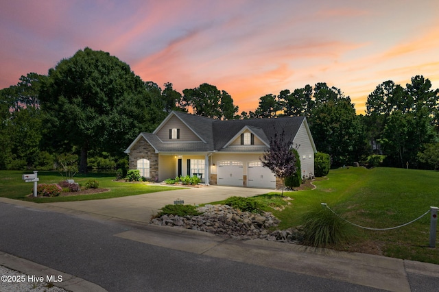 3710 Calla Lilly Ct, Southport, NC 28461 - traditional-style house with driveway, a front lawn, an attached garage, and view of scattered trees