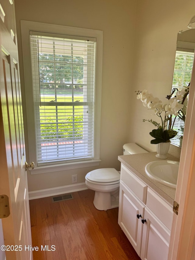 280 Green Forest Cir, Dunn, NC 28334 - bathroom featuring vanity and wood finished floors