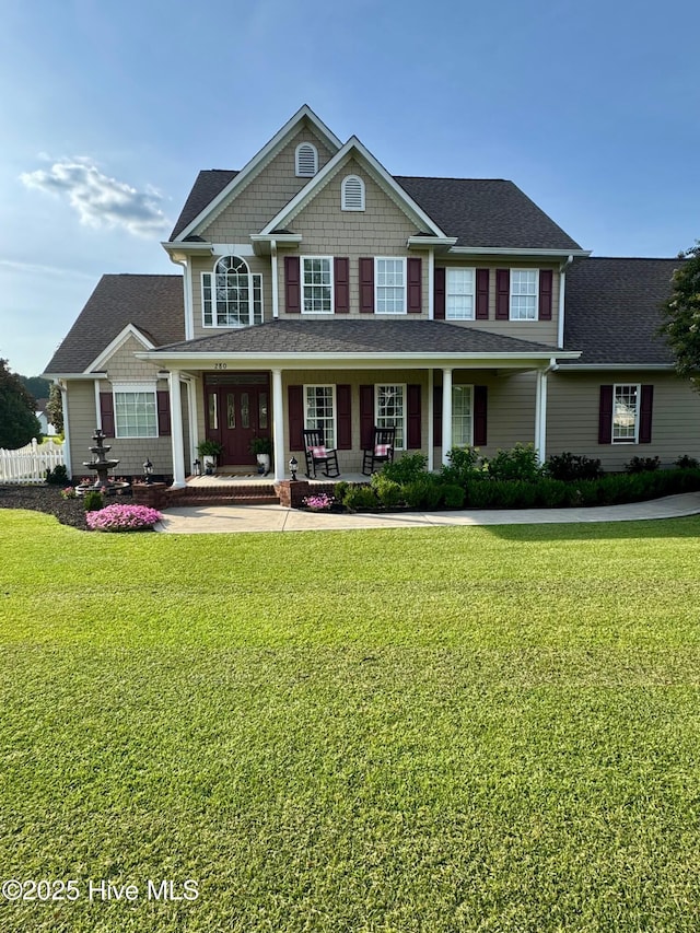 280 Green Forest Cir, Dunn, NC 28334 - view of front of house featuring a porch, a front lawn, and roof with shingles