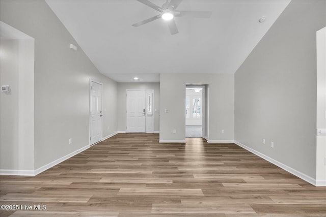 111 Yaupon Ct, Hampstead, NC 28443 - unfurnished living room with ceiling fan, wood finished floors, recessed lighting, and lofted ceiling