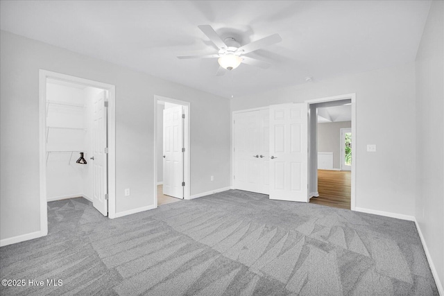 111 Yaupon Ct, Hampstead, NC 28443 - unfurnished bedroom featuring a closet, carpet, and ceiling fan