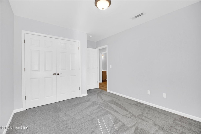 111 Yaupon Ct, Hampstead, NC 28443 - unfurnished bedroom featuring carpet flooring and a closet