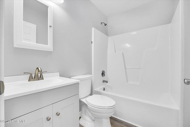 111 Yaupon Ct, Hampstead, NC 28443 - bathroom featuring vanity, shower / bathtub combination, and wood finished floors